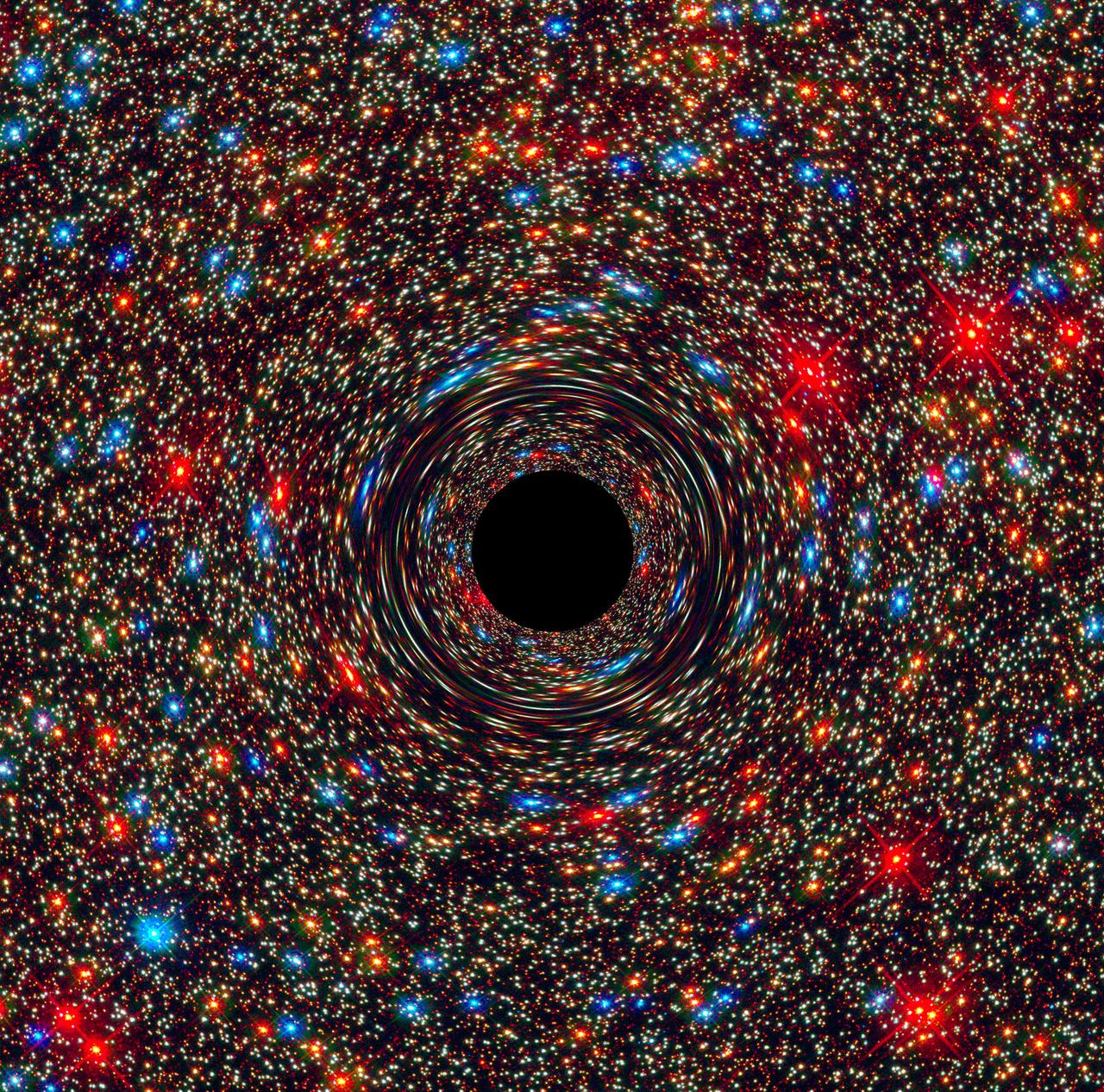 NASA computer simulation of a black hole bending a bright field of stars.